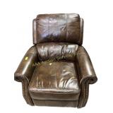 Brown leather recliner with nailhead trim