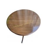 Solid wood round end table with metal lions foot