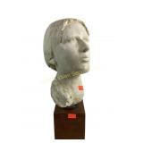 Woman plaster head with stand.