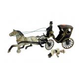 Cast iron horse with coach, driver and passenger.