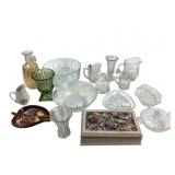 Clear glass small pitchers, vase, serving bowls.