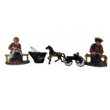 Cast iron farmer and wife book ends.