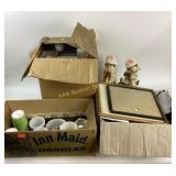 Children figures, red bows, battery