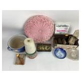 Stoneware embossed bowl. Cone of white twine,