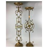 Wrought iron pedestal stands.