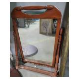 Wooden freestanding mirror with a classic frame