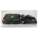 X-Box games system base no cords or controllers,