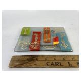 Higgins glass ashtray.