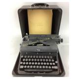 Royal-Arrow Manual Typewriter with case and key,