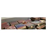 Vinyl records in albums, an old beer bottle by