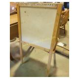 wooden childrenï¿½s easel with a white board