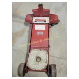 Blackhawk 1.5-ton hydraulic floor jack in red.