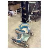 blue and white childï¿½s walker with metal frame