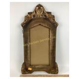 Ornate hanging frame.