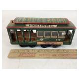 Tin train car. Bay Taylor St