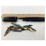 2 fountain pens with tips.