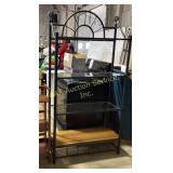 Black metal bakerï¿½s rack with arched top and