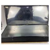 Tin metal case with floral imprint on lid has