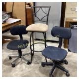 A collection of three chairs, including two