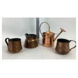 Brass/ copper pot, cups and watering can.