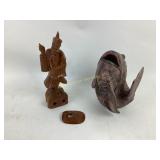 Wood carved Asian fisherman.  Pottery fish