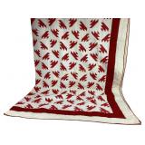 Red cream quilt - some staining