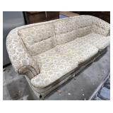 Berne Furniture A three-seat vintage sofa with a