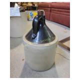 2 gallon jug with cork