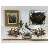Metal wall candle sconces. Decorative mirror.