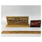 Woolrich display signs.