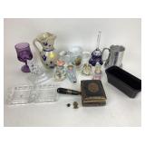 Black amethyst dish. Pottery pitcher, glass bell.