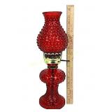 Red glass electric hobnail lamp. Powers on