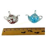 St. Claire style art glass tea pot paperweights.