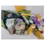 Crafting items. Mesh tubes. Quilt batting. Fabric.