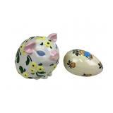 Decorative piggy bank, some chips and wear, and