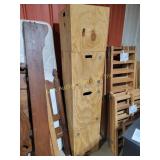 Stack of four homemade wooden storage boxes with
