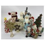 Christmas Snowman and Santa figurines.