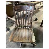 Swivel rolling wood chair