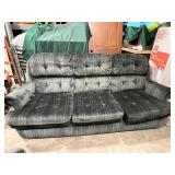 Green striped velour tufted sofa
