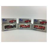 Welly diecast cars 1957 Chevrolet corvettes.