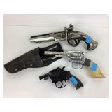 Sprint cap gun. Metal dueling pistol split in