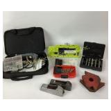 PerforMax rotary tool in case.  Drill bits.