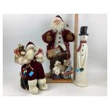 Christmas Snowman and Santa figurines.