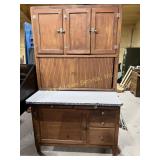 Hoosier cabinet with porcelain top and flour