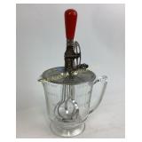 Hand crank mixer and 4 cup glass measuring