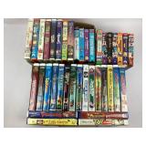 Collection of VCR Tapes and Books