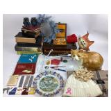 Collection of cuff links and tie clips in wooden b