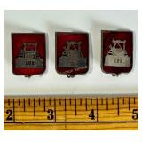 Set of 3 antique enamel badges, red background