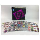 Binder with assorted collectible pogs