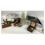 Bird sculptures, candles, model car